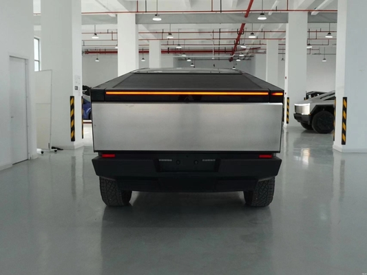 Silver Tesla Cyber Off-Road Pickup Truck with All Steel Body and 180 Km/h Max Speed